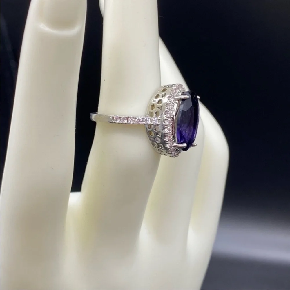 Sterling Silver amethyst prong set cocktail ring with gemstone halo bezel